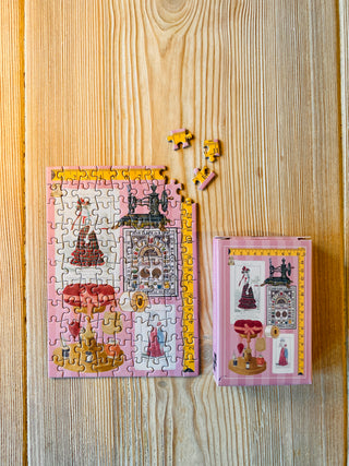 Couture Chronicle 99-piece mini puzzle from Penny Puzzle